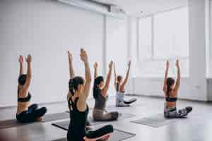 Free photo yoga group classes inside the gym