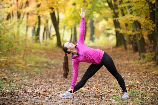 Yoga outdoors: Utthita Trikonasana pose