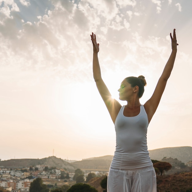 Yoga session withthe sunset