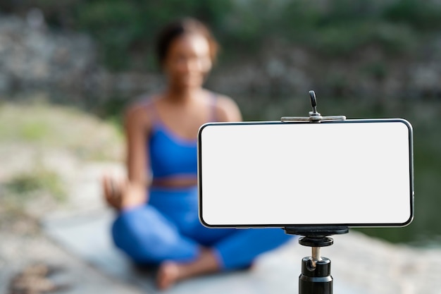 Yoga teacher practicing outdoors