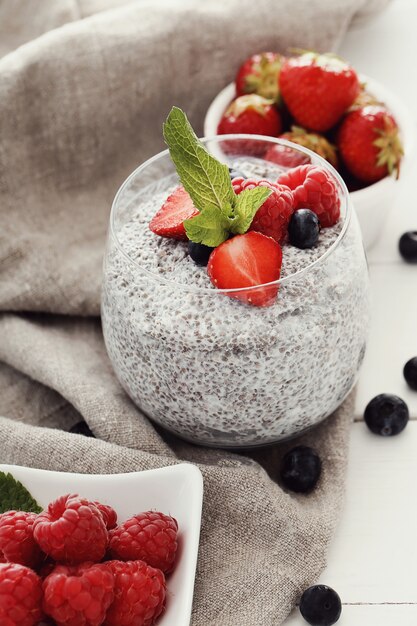 Yogurt with chia seed and berries in glass