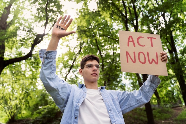 Free photo young activist taking action