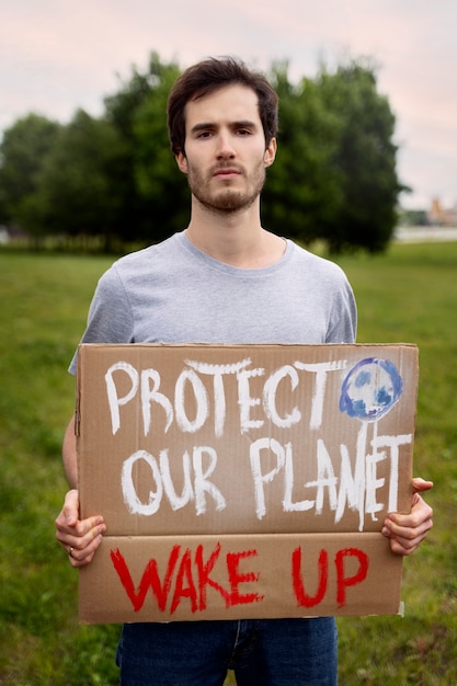 Free photo young activist taking action