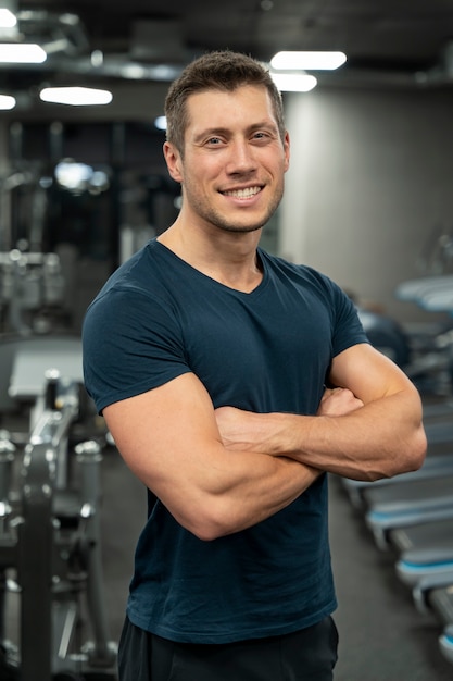 Young adult doing indoor sport at the gym