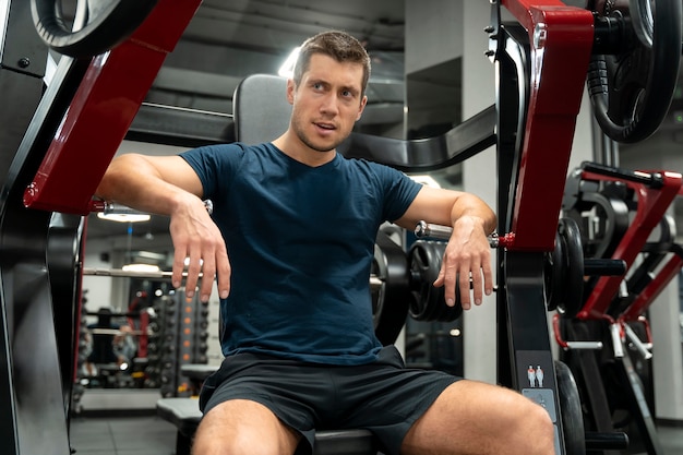 Young adult doing indoor sport at the gym