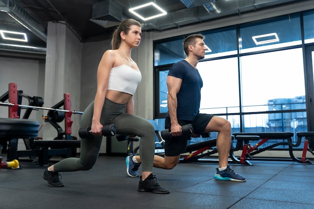 Young adult doing indoor sport at the gym