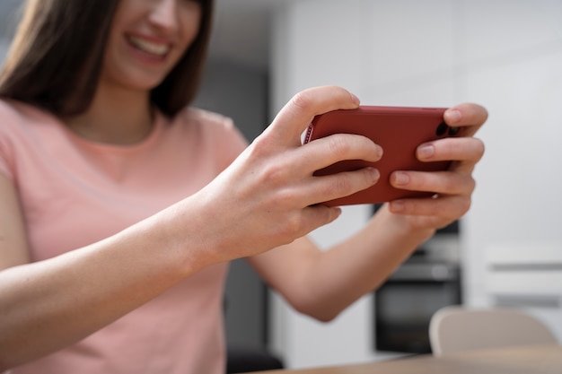 Young adult enjoying playing video game