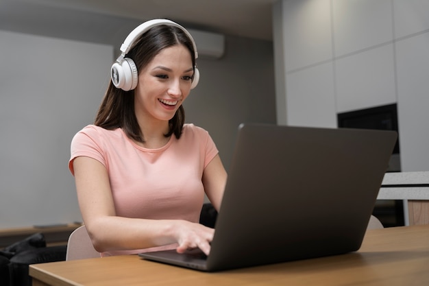 Young adult enjoying playing video game