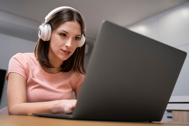 Young adult enjoying playing video game