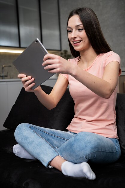 Young adult enjoying playing video game