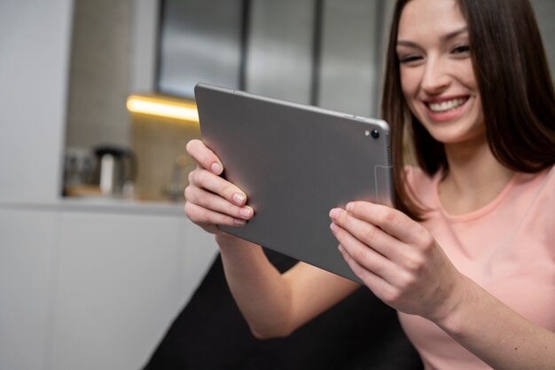 Young adult enjoying playing video game