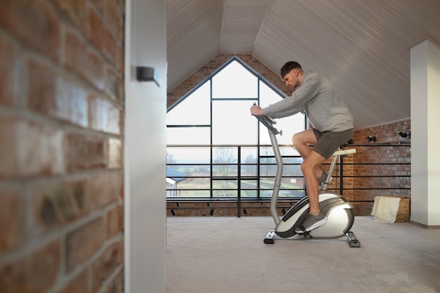 Young adult exercising at home