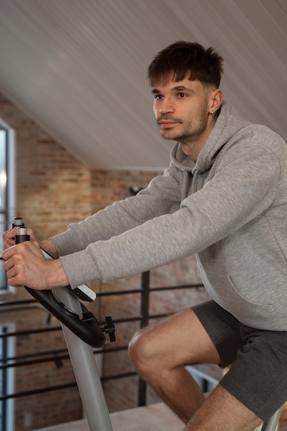 Young adult exercising at home