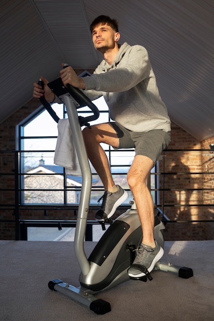 Young adult exercising at home