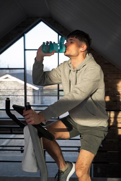 Young adult exercising at home