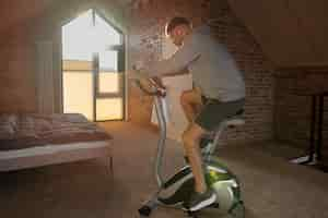 Free photo young adult exercising at home