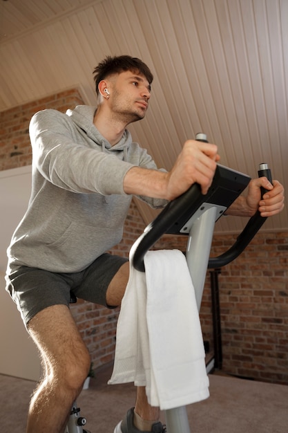 Young adult exercising at home