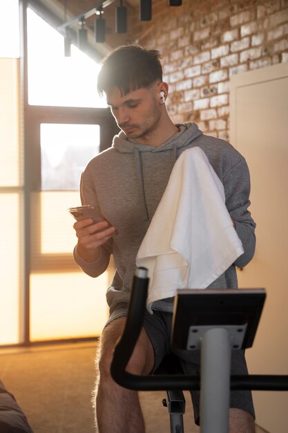 Young adult exercising at home