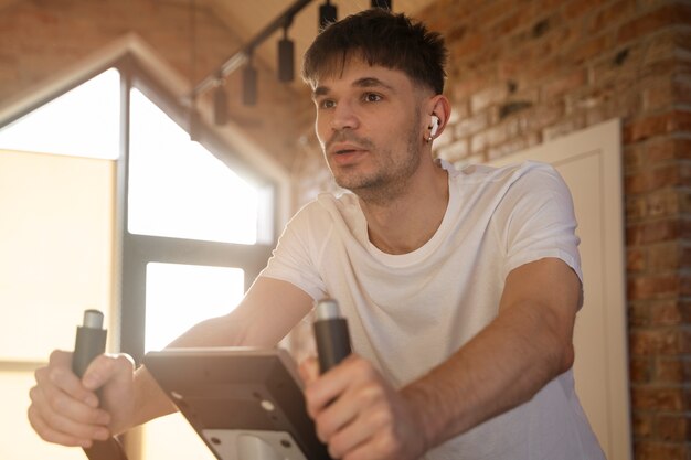 Young adult exercising at home