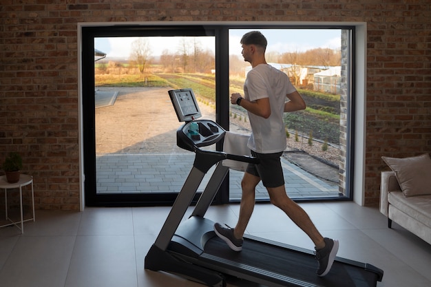 Young adult exercising at home