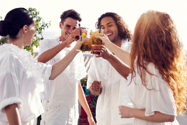 Free photo young adult having fun at white party