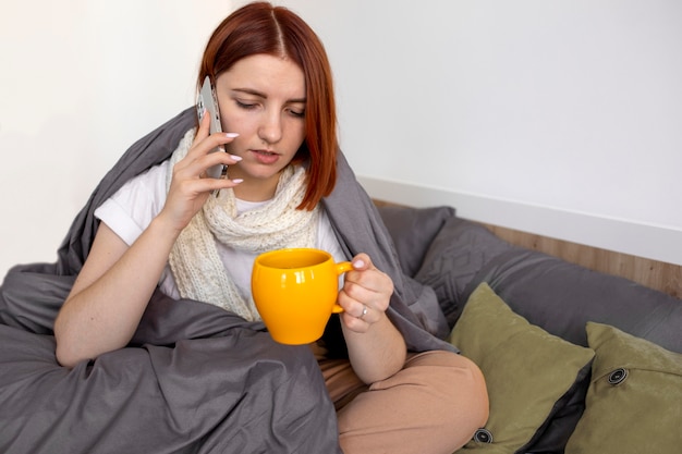 Young adult at home suffering from illness