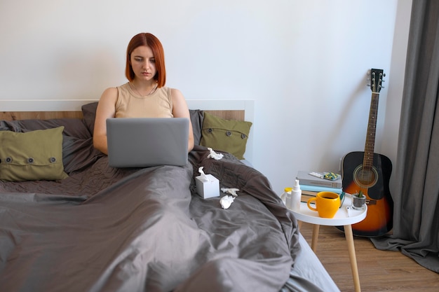 Young adult at home suffering from illness