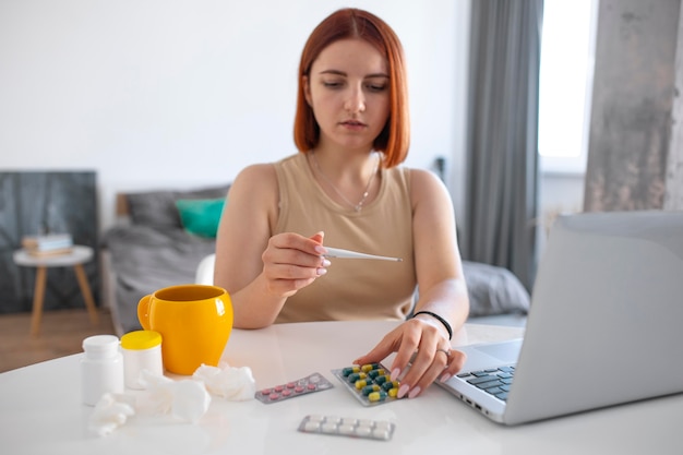 Young adult at home suffering from illness