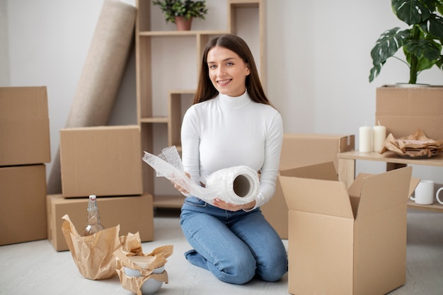 Young adult moving in new house