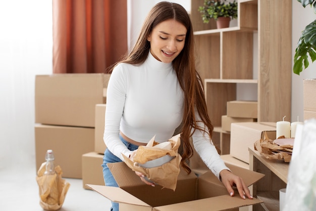 Young adult moving in new house