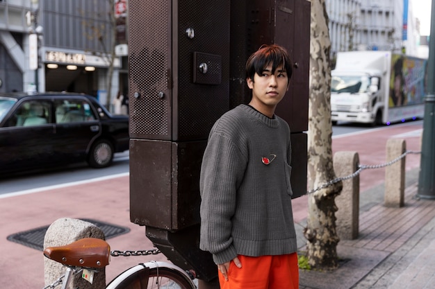 Free photo young adult on tokyo streets