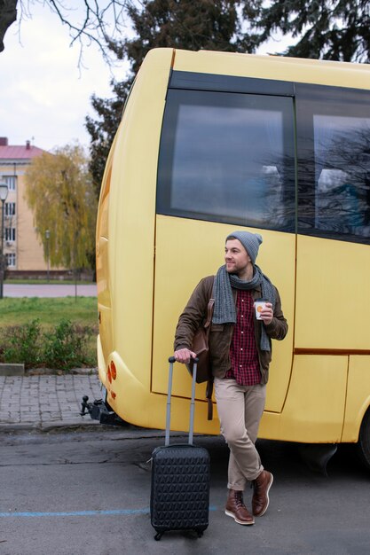 Young adult travelling in winter time