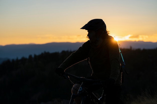 Young adult using electric bike in the country side