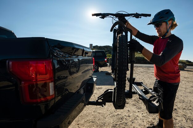 Young adult using electric bike in the country side