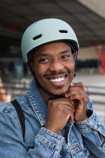 Young adult using electric scooter for transportation