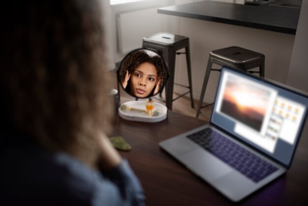 Young adult using face care product