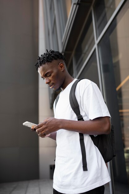 Young adult using his digital device