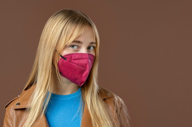 Free Photo young adult wearing face mask