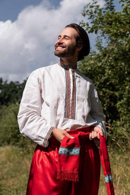 Young adult wearing folk dance costume