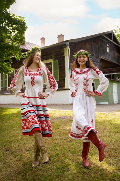 Free Photo young adults having fun while folk dancing