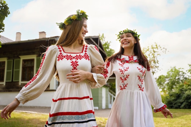 Young adults having fun while folk dancing