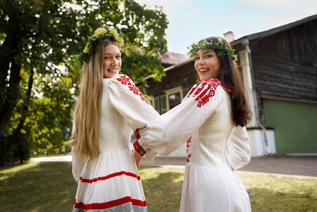 Free Photo young adults having fun while folk dancing