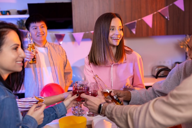 Free photo young adults having a party at home