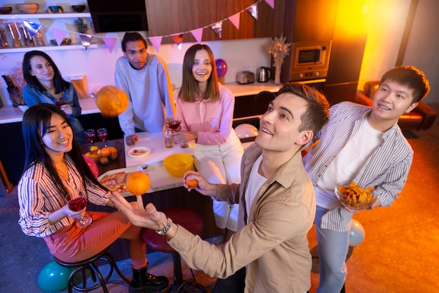 Free photo young adults having a party at home