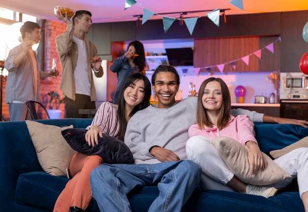 Free photo young adults having a party at home