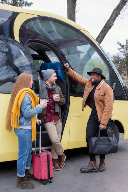 Young adults travelling in winter time