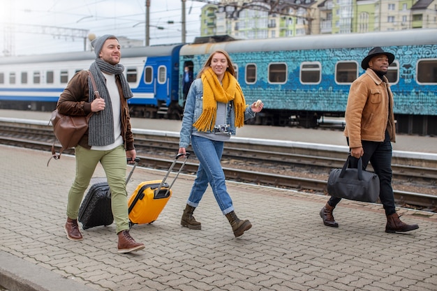 Young adults travelling in winter time