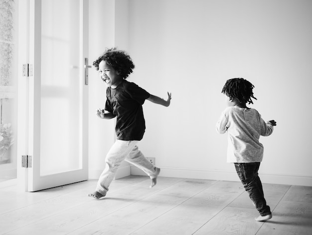 Free Photo young african boys playing in their new house