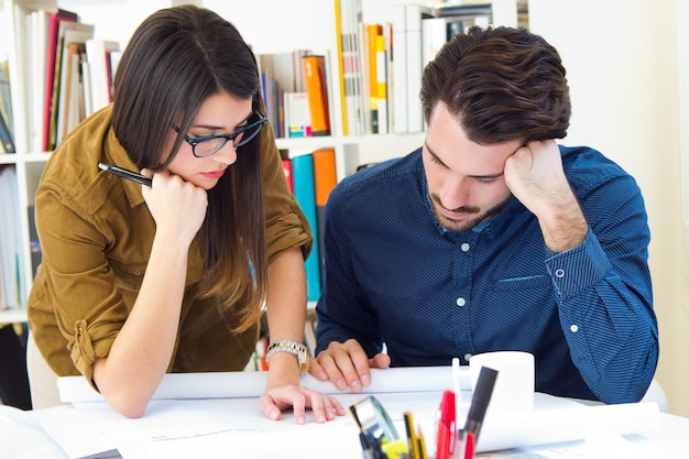 young architect team working at office