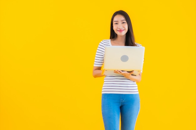 young asian woman use laptop or notebook